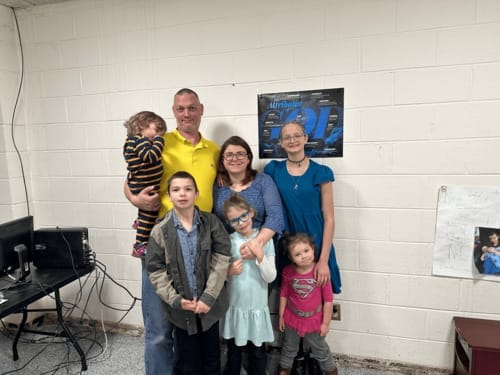 Adults and children spending time together at First Baptist Church