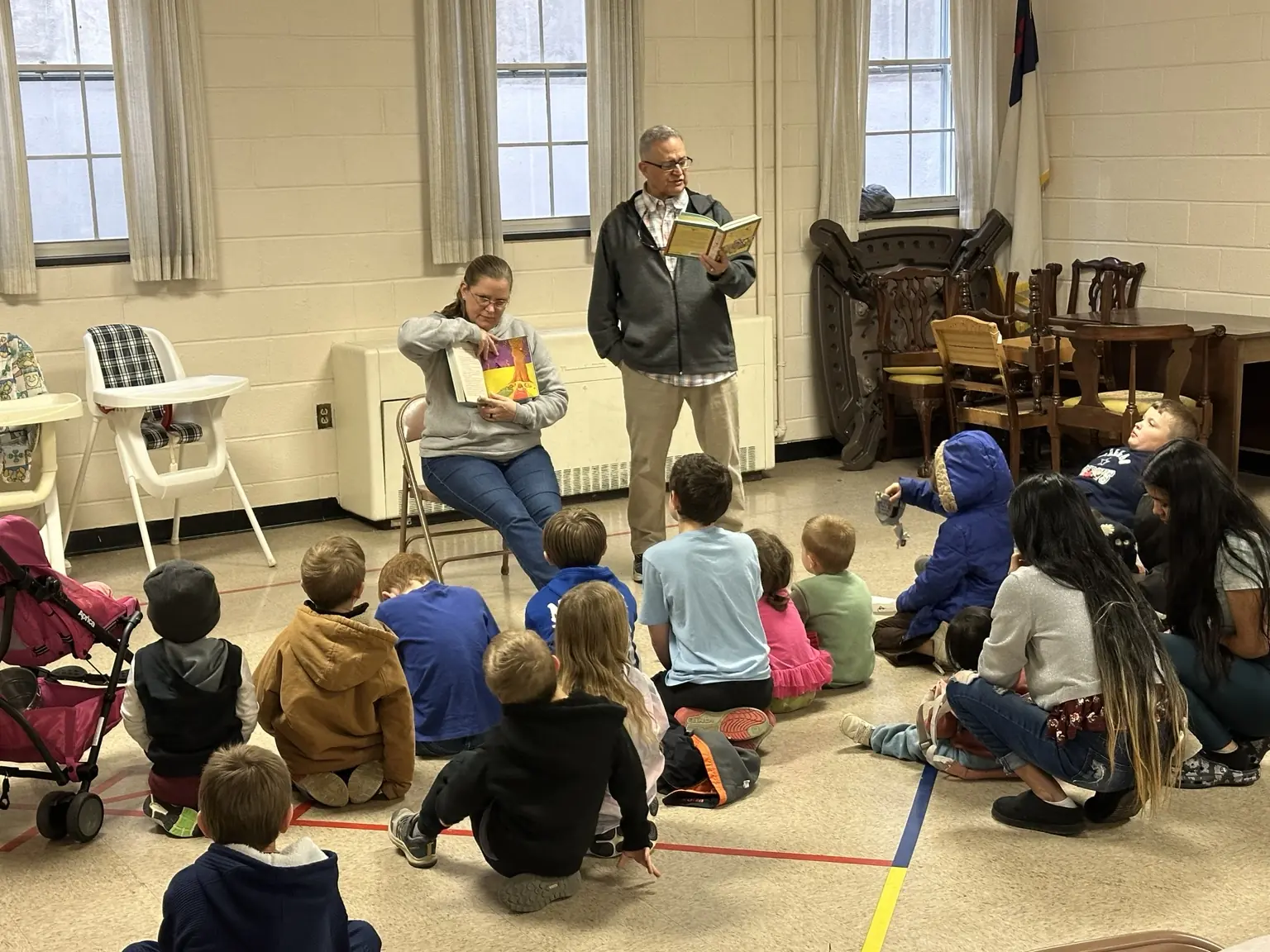 Children listening to a Bible story at First Baptist Church