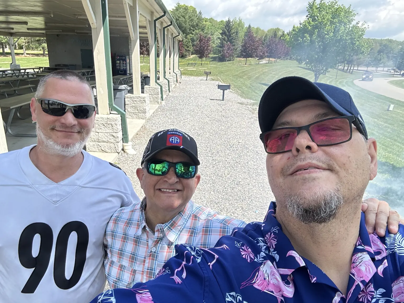 Friends smiling together at a church picnic